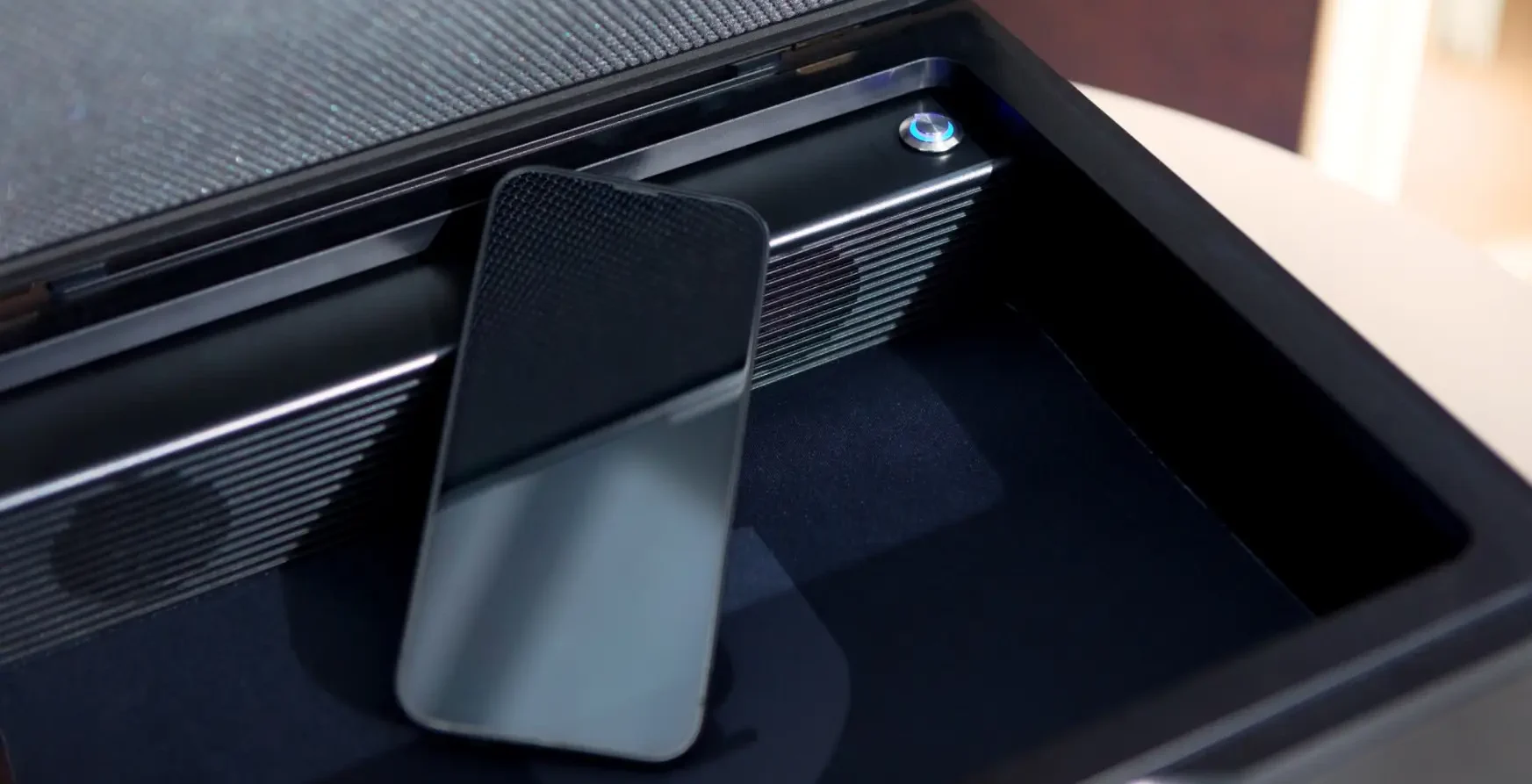 noisebox with mobile phone in it